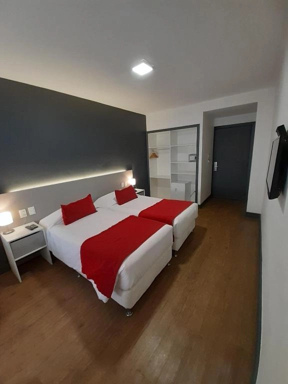 dormitorio_camas_individuales_hotel_oxford.webp