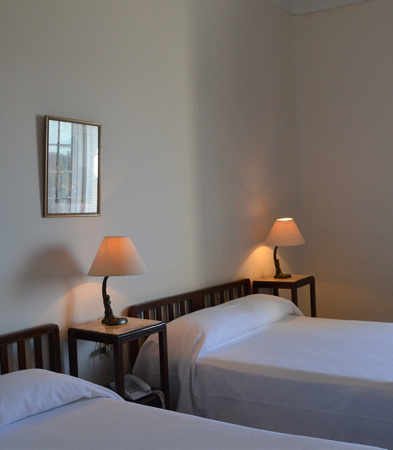 dormitorio_camas_individuales_argentino_hotel.webp